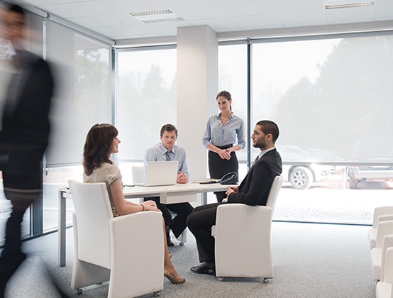 modern office with 5 people in business attire